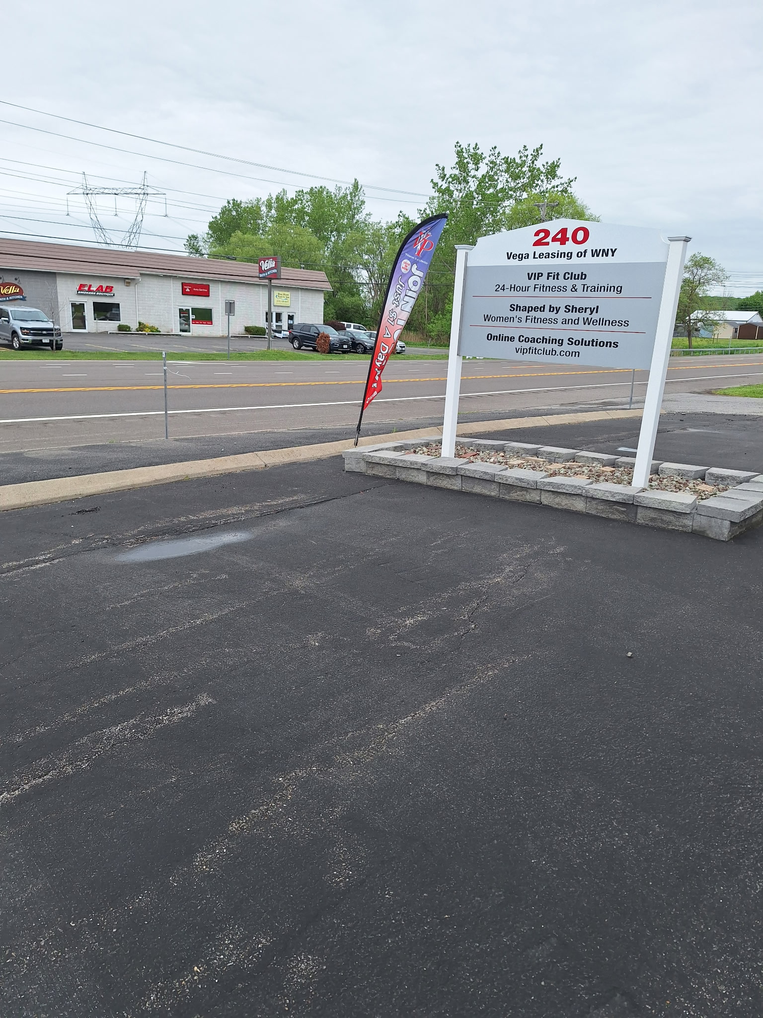 Vega Leasing of WNY roadside sign and Route 31 access in Macedon